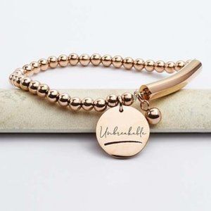 Rose Goldtone 'Unbreakable' Charm Bracelet